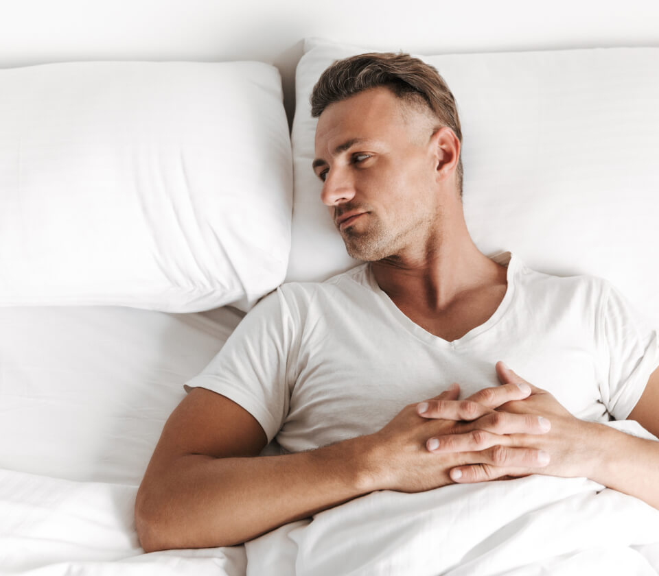 upset-man-laying-in-bed-and-looking-away-2023-11-27-05-17-01-utc 1 (1)